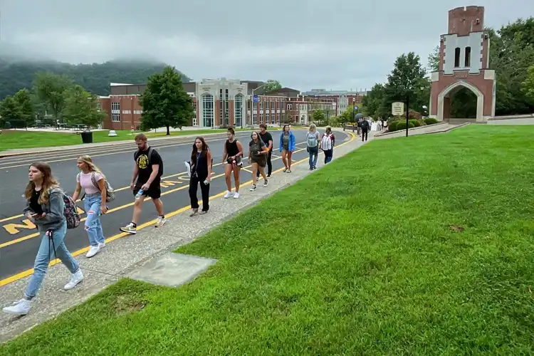 Students walk across campus on first day of class