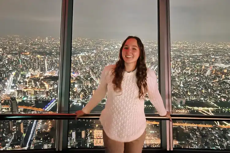Kiera Fehr with Tokyo view behind her