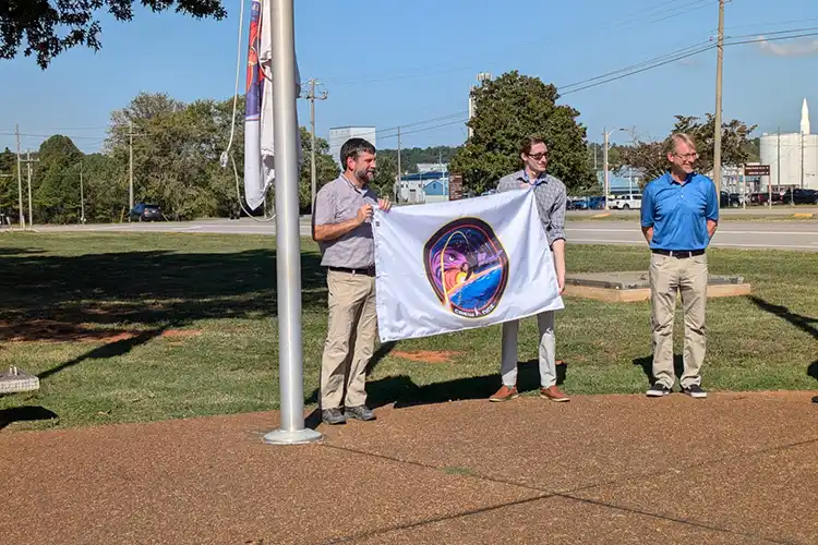 Brady Doepke raising flag for Crew-9