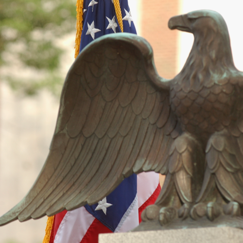 Eagle Statue and U.S. Flag