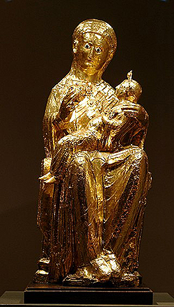 Gold sculpture of figure and child